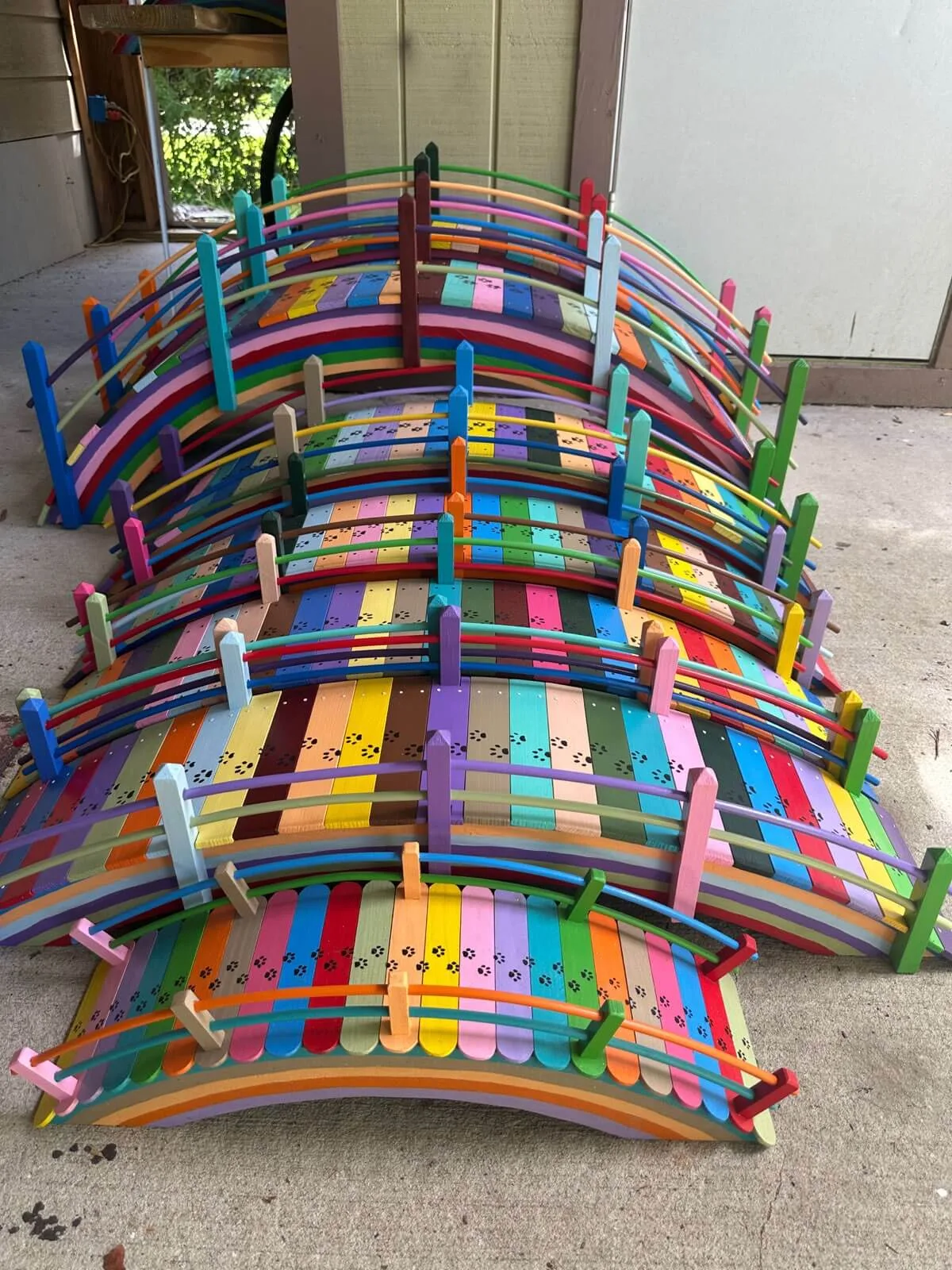 Paul's rainbow bridges, painted with paw prints