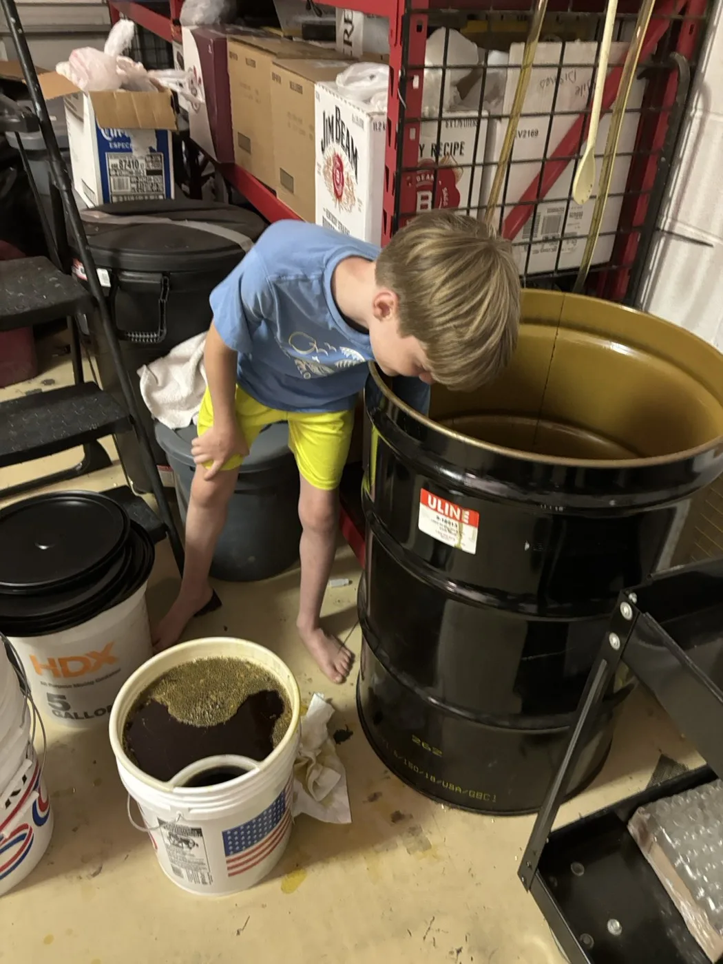 Rogan mixing a barrel of the herbal formula