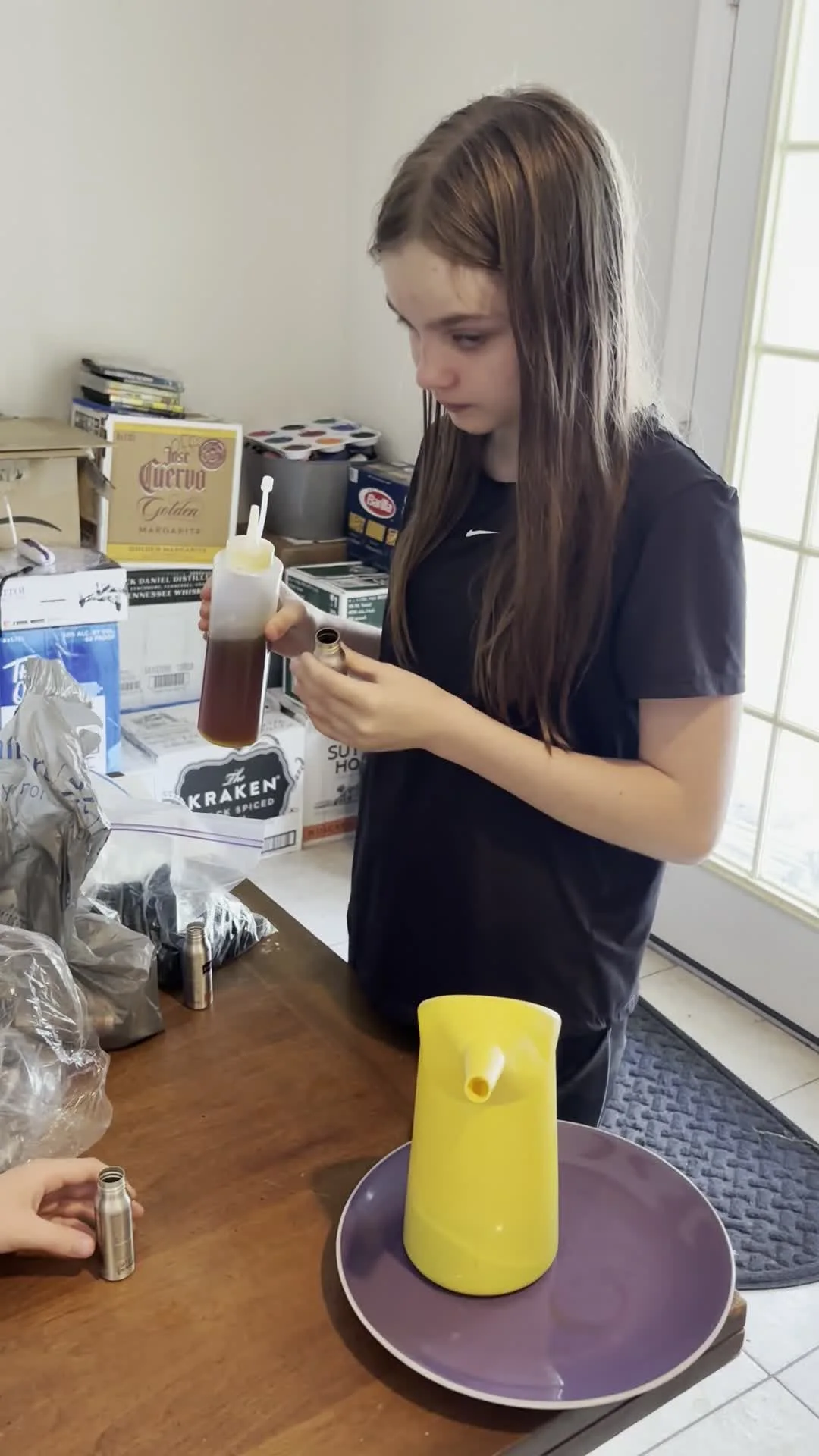 Sterling filling spray bottles by hand